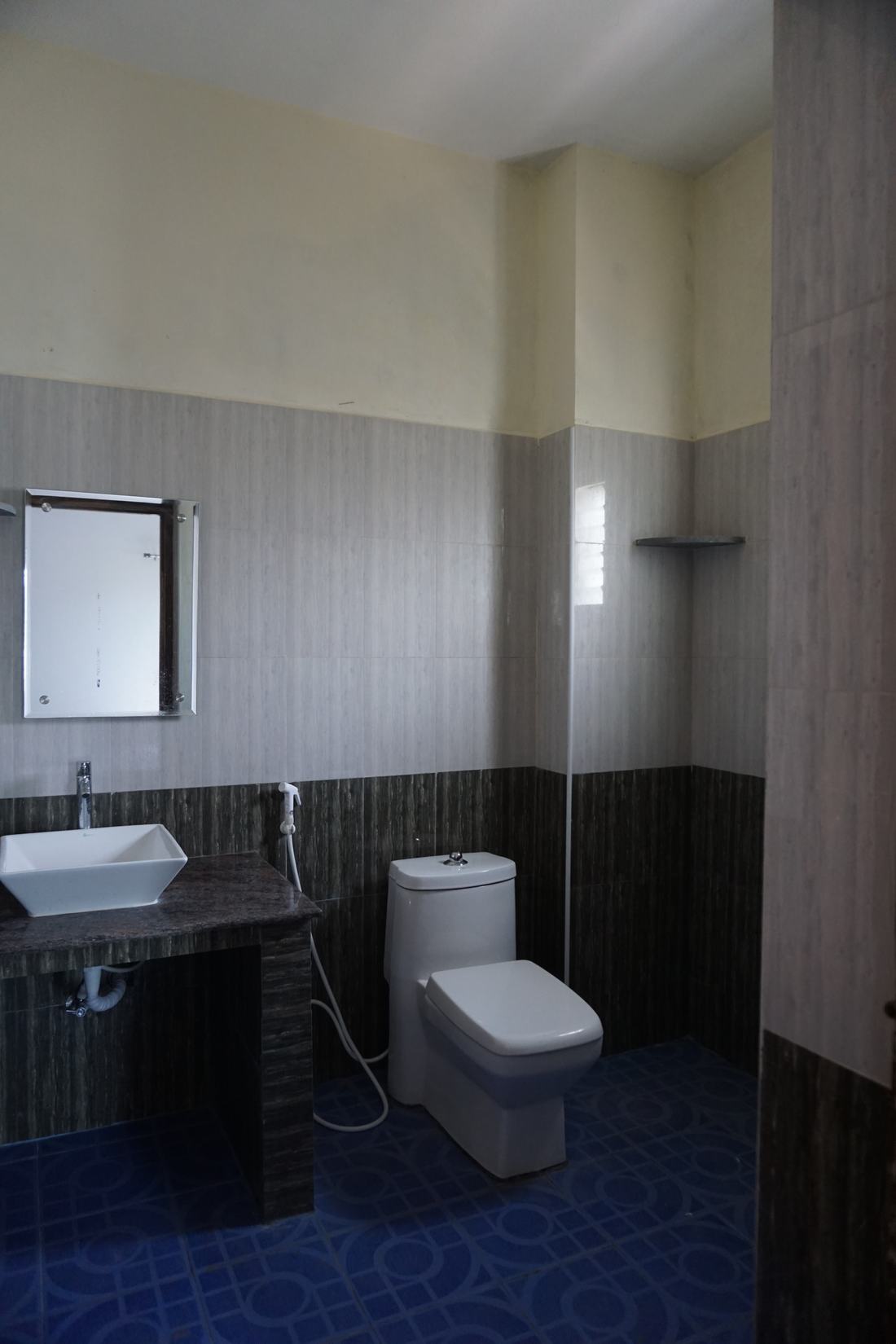 Vayu room G4, Art Le Cafe Auroville — bathroom sink and toilet, alternate angle