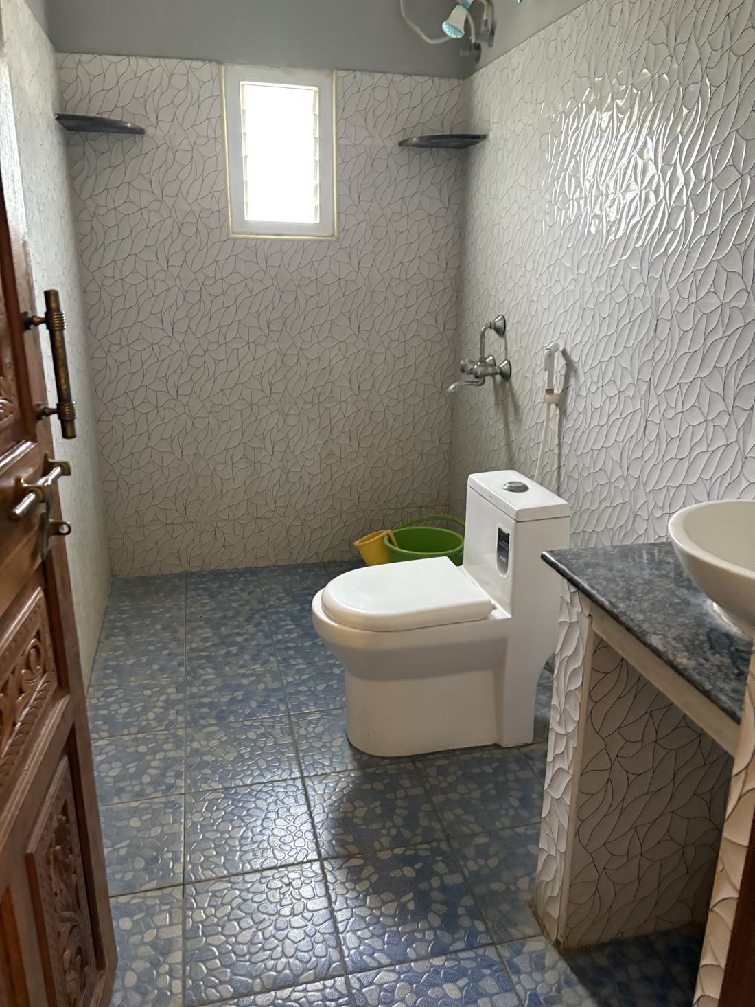 El Dorado room F12, Art Le Cafe Auroville — bathroom with toilet and sink