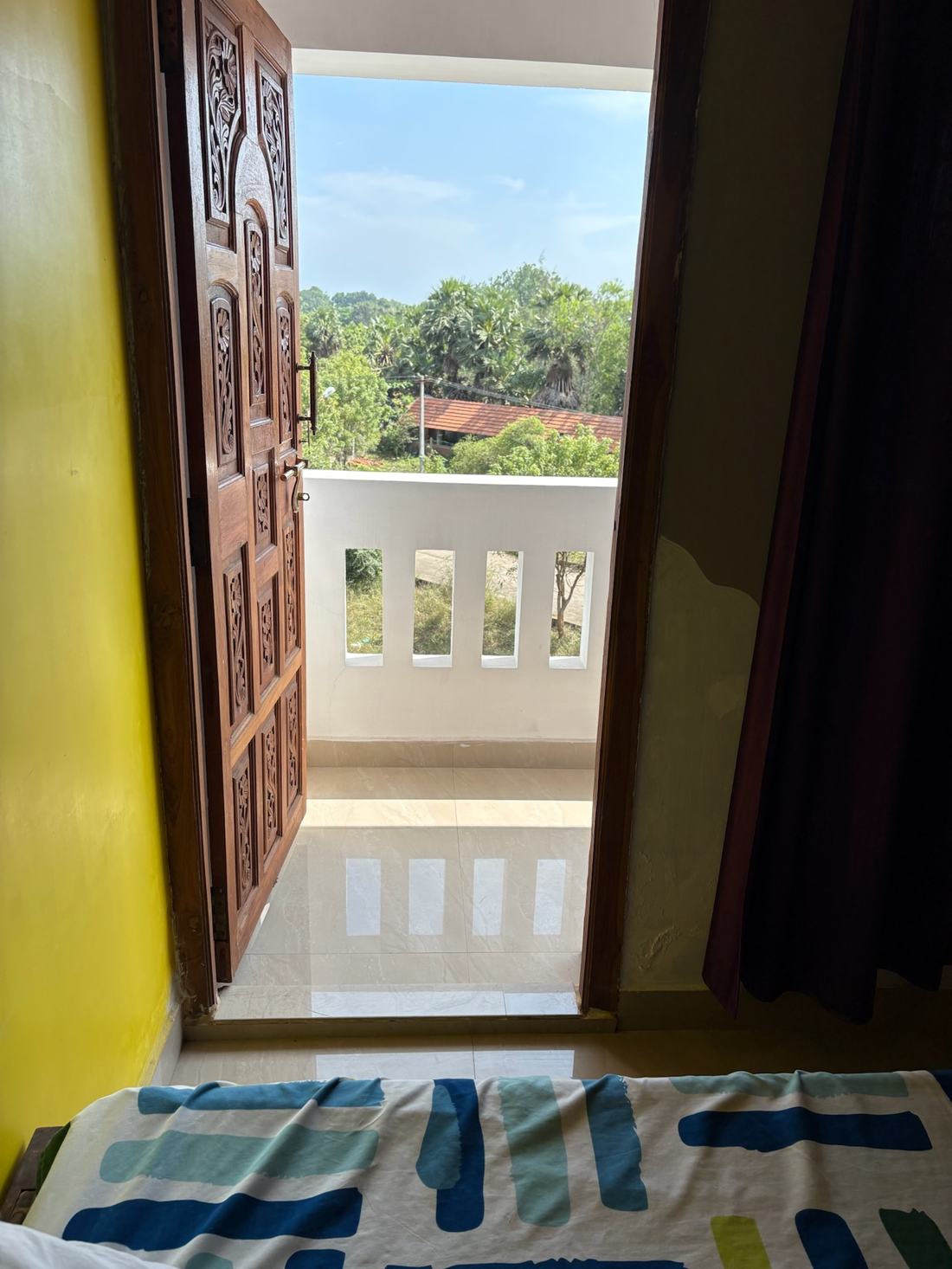 Ganesha room S17, Art Le Cafe Auroville — balcony view