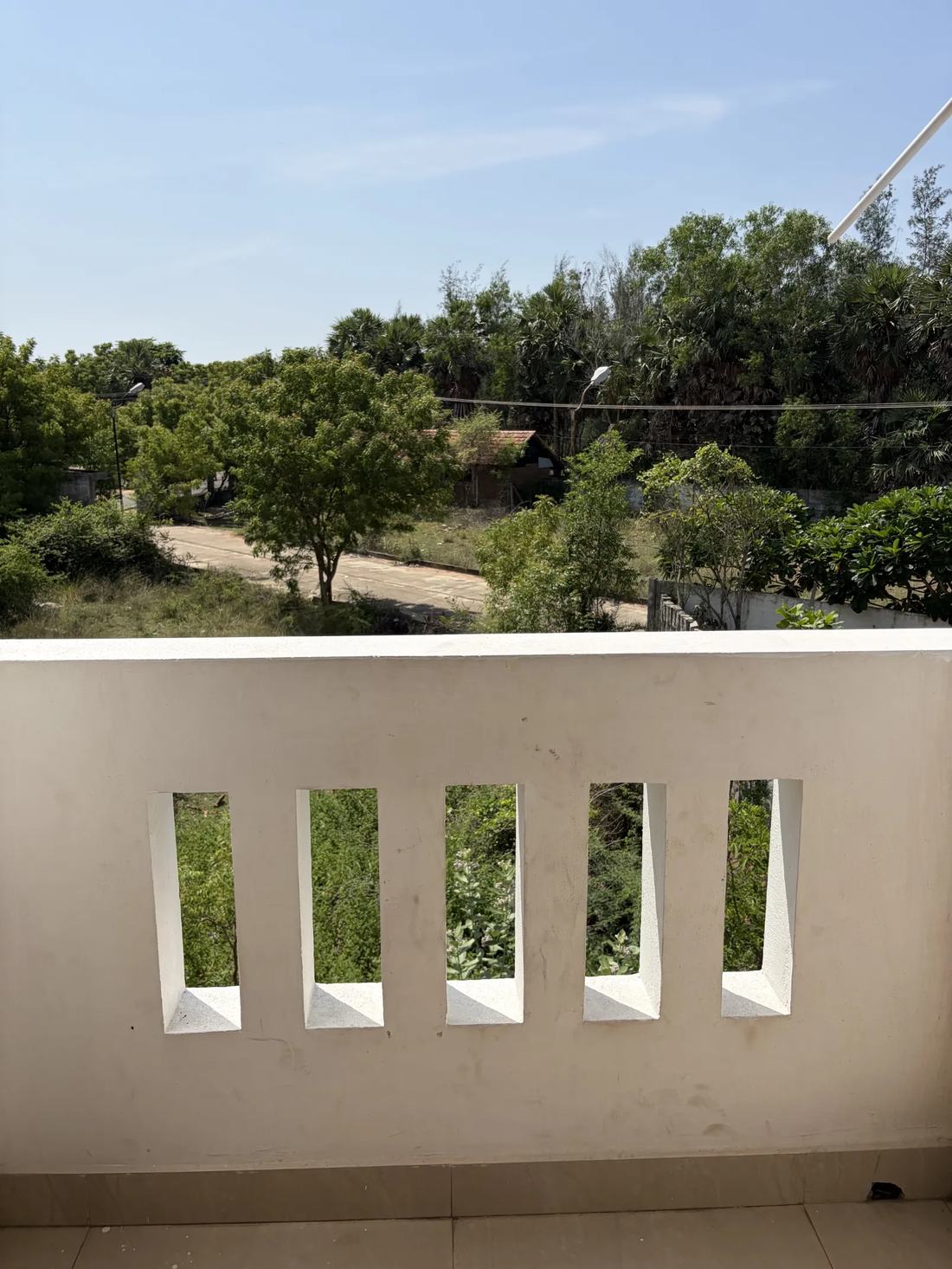 Osiris room S18, Art Le Cafe Auroville — balcony view