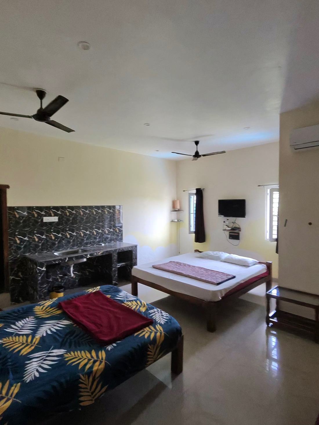 Hera room S19, Art Le Cafe Auroville — beds and AC